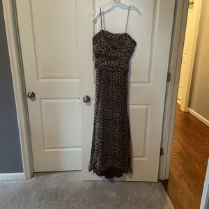Animal print gown with trail